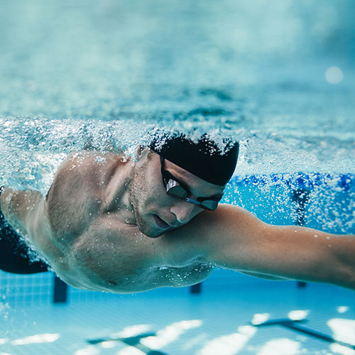 SI Joint Fusion - Underwater Look at Swimmer Doing Laps